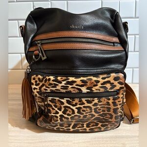 Leopard and black backpack purse